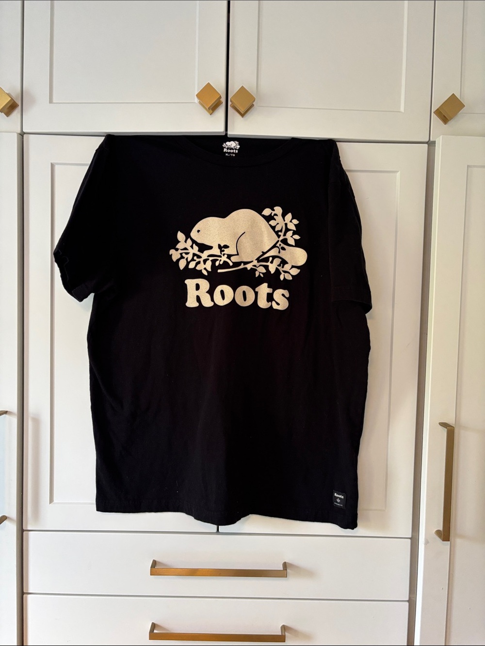 Roots Black Tee with Cream Beaver Logo